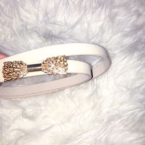 Tan belt with bow buckle